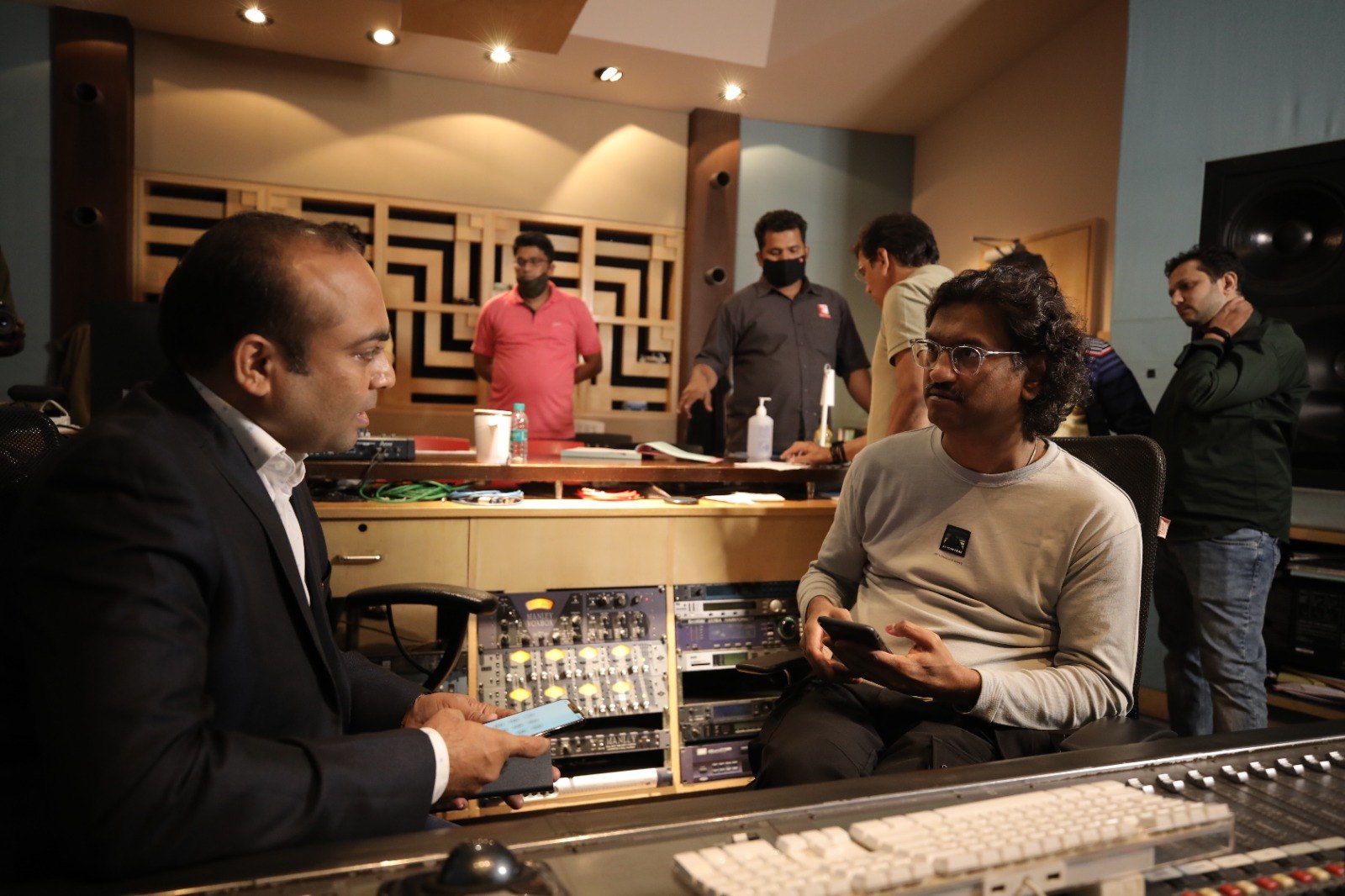 Sanjivkumar Rathod with Ajay Gogavale in a recording studio